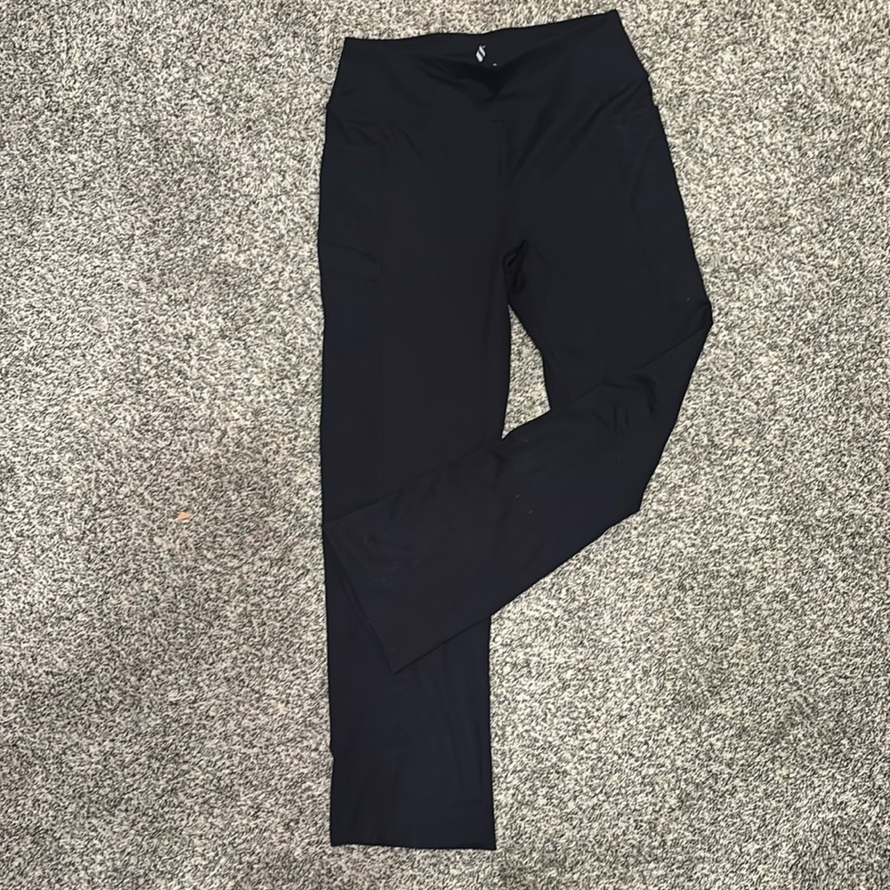 Black Sketchers Stretch Pants with side and back pockets